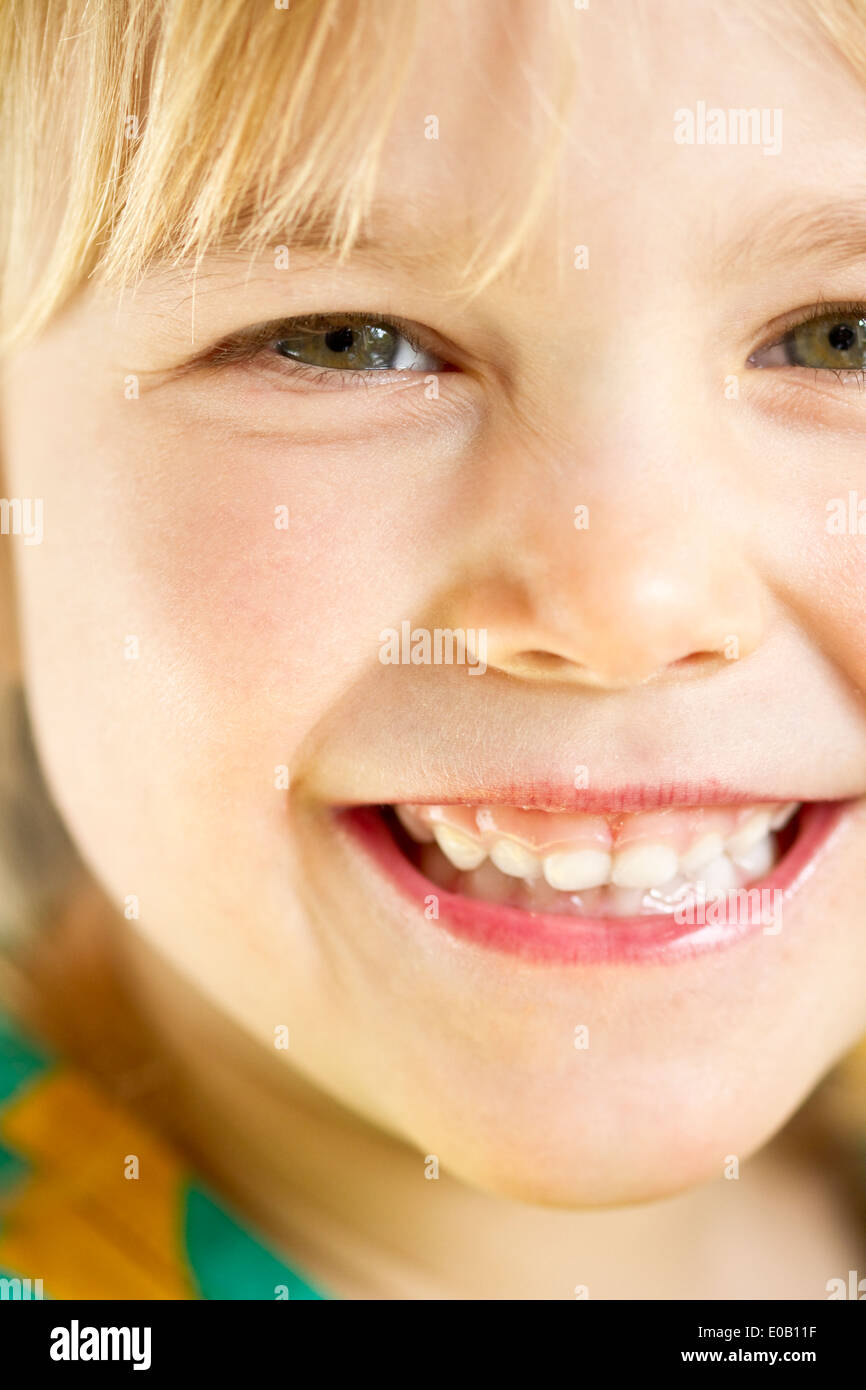 Portrait of little girl smiling, close-up Stock Photo - Alamy