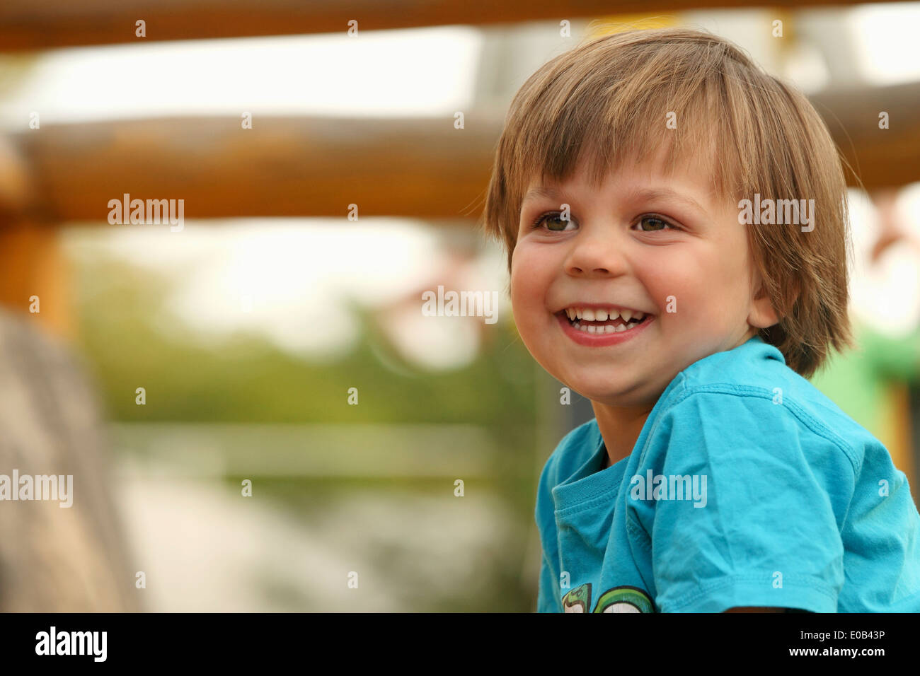 Portrait of smiling little boy at playground Stock Photo - Alamy