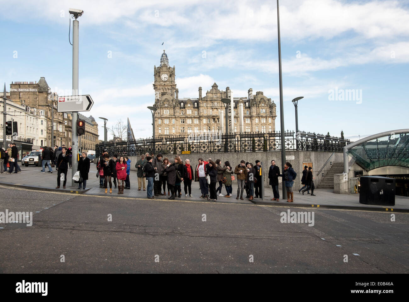 Pedestrians wait the traffic light in Edinburgh, Scotland Stock Photo