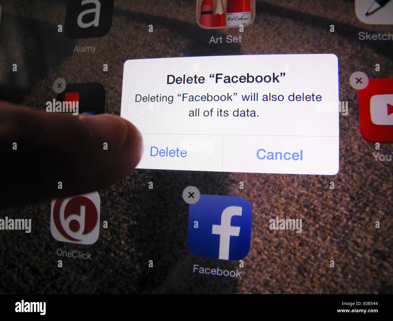 Deleting Facebook from iPad Stock Photo