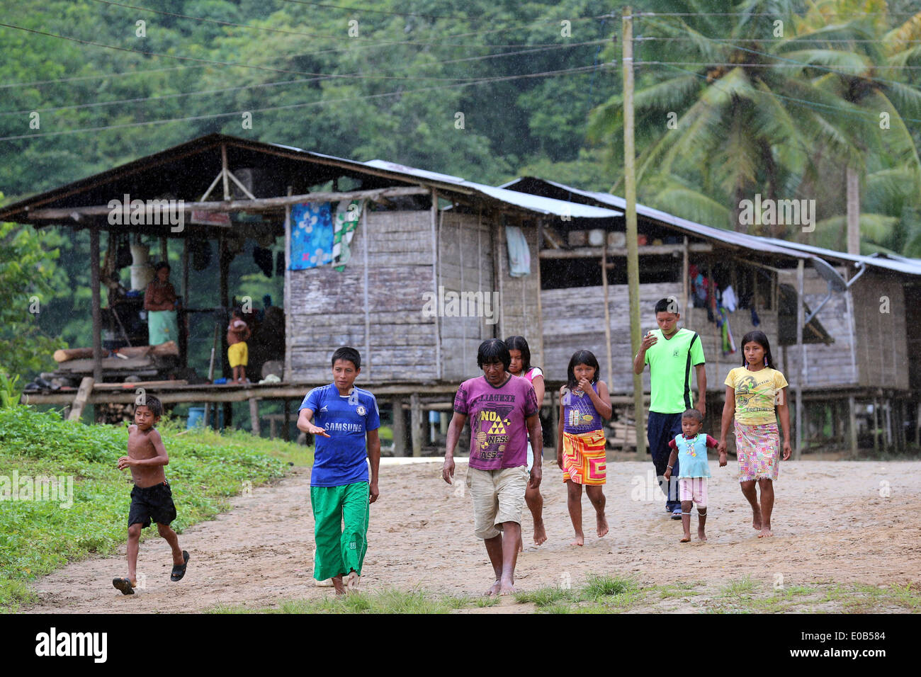 indigenous tribes people and wooden houses on stilts in the jungle village Puerto Alegre Nauca,  Choco province,  Colombia Stock Photo