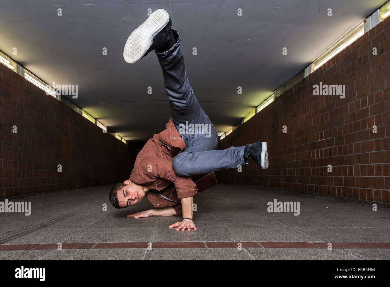 Young breakdancer in underpass Stock Photo