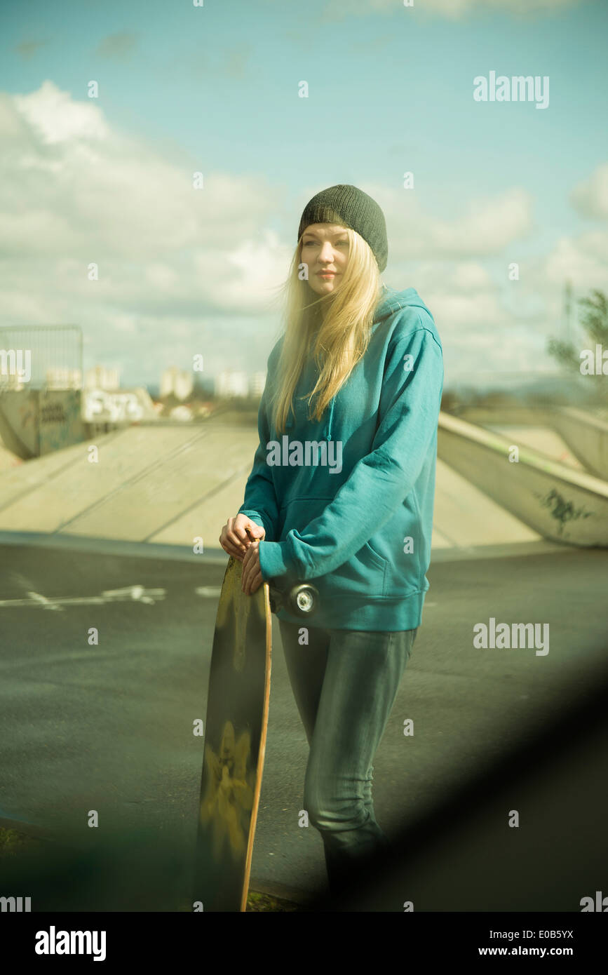 Germany, Mannheim, Young woman at skate park Stock Photo