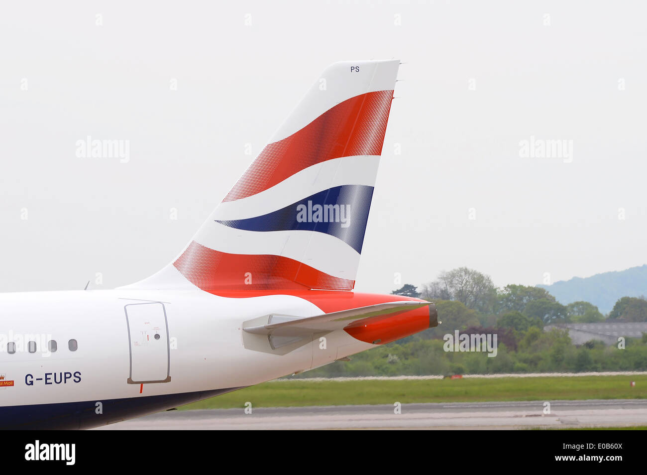 A British, Airways, Airbus, A319 (G-EUPS) taxiing on the runway at Manchester Airport Stock Photo
