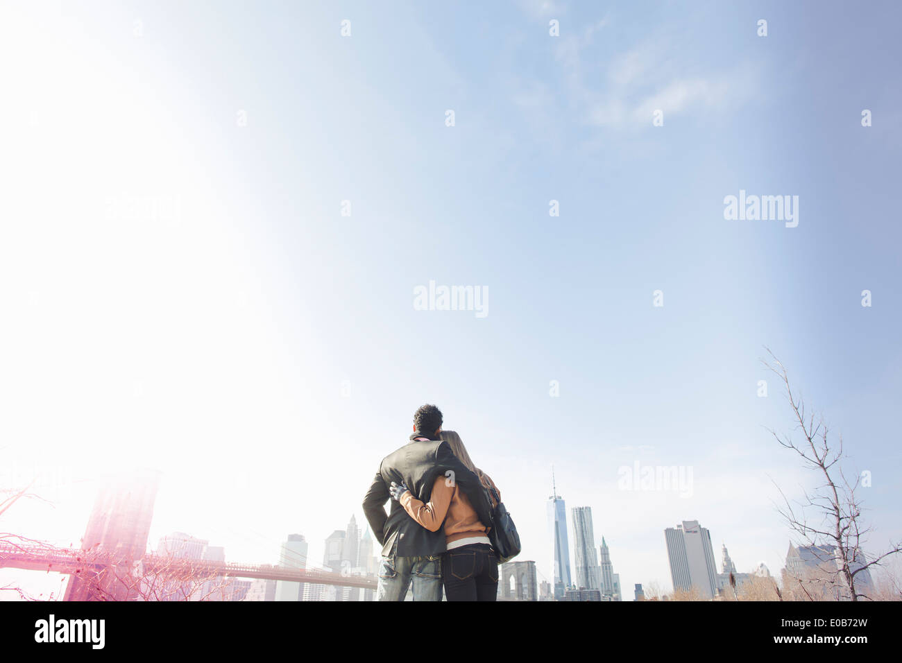 Young couple next to Brooklyn Bridge, New York, USA Stock Photo