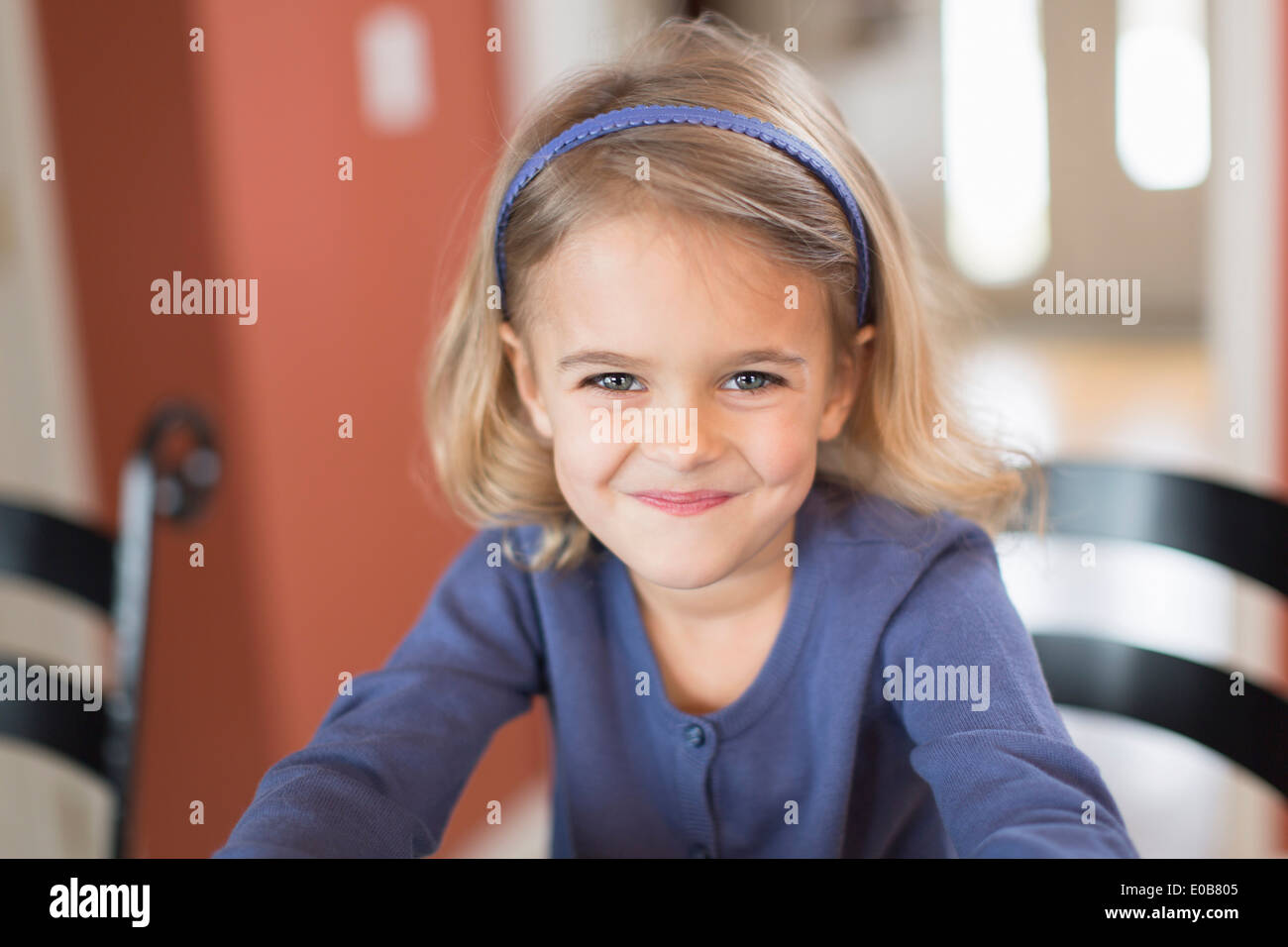 Portrait of smiling cute young girl Stock Photo