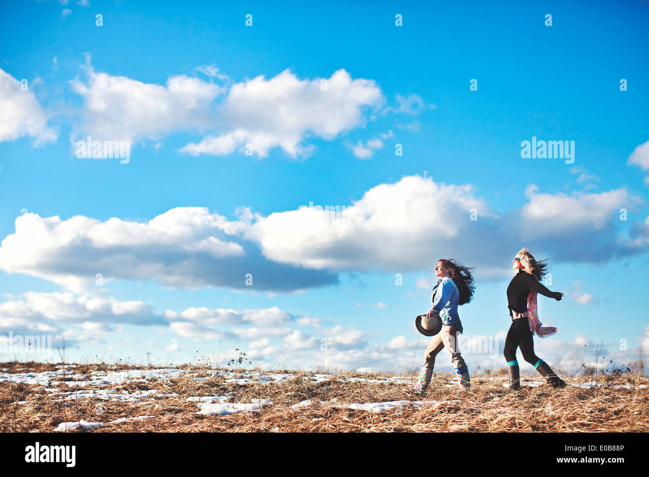 Two mature women enjoying exhilarating walk Stock Photo