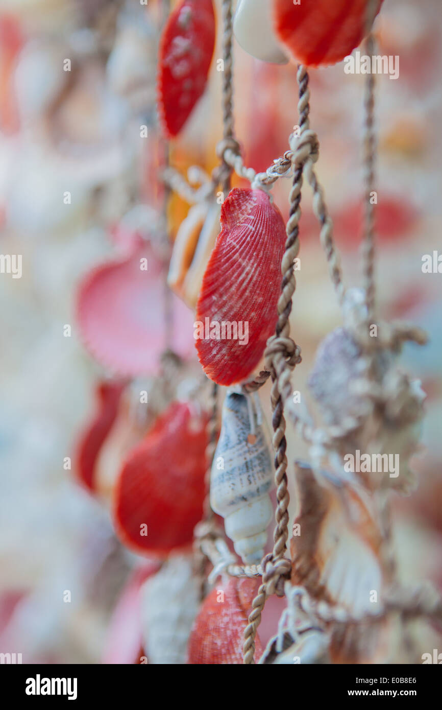 Close up of fishing net decorated with seashells Stock Photo