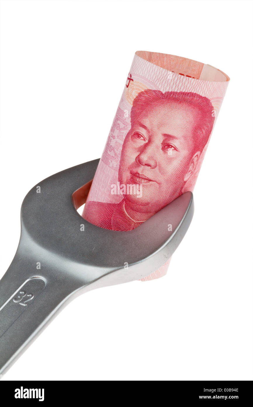 Tools and bank notes chinese yuan Stock Photo
