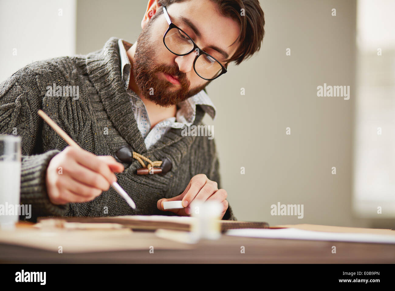 Image young man painting hi-res stock photography and images - Alamy