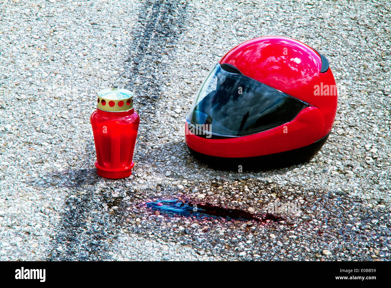 An accident by motorcycle. Traffic accident with skid mark on street. Symbolic photo., Ein Unfall mit Motorrad. Verkehrsunfall m Stock Photo