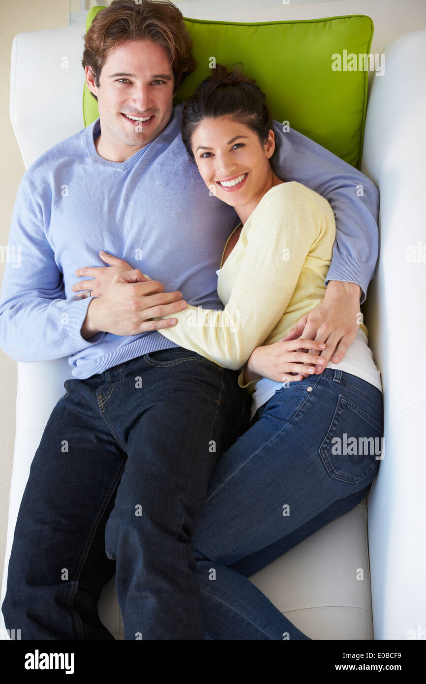 Overhead View Of Couple Relaxing On Sofa Stock Photo Alamy