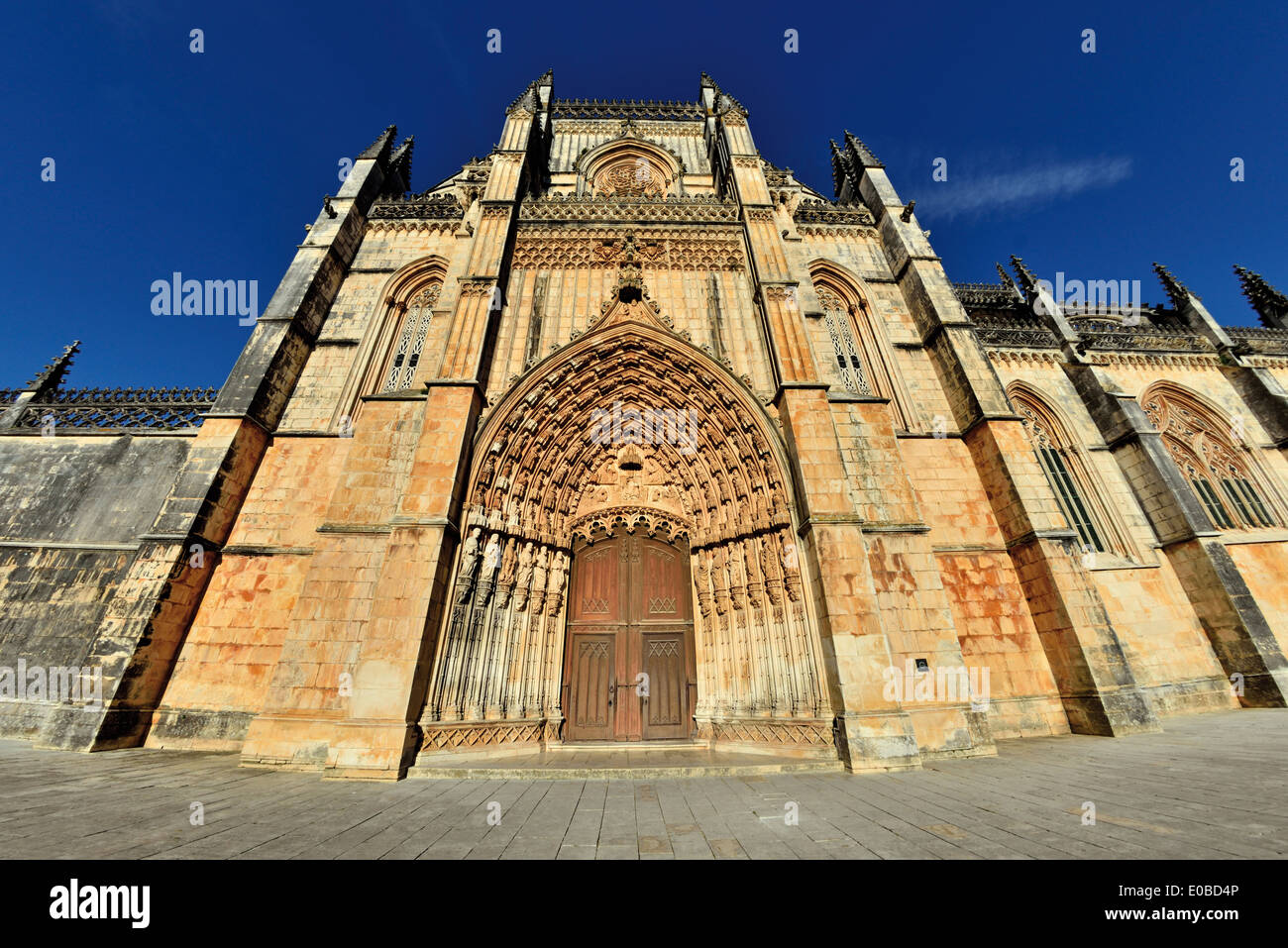 Portugal: Gothic gateway of the Monastery Santa Maria da Vitoria in Batalha Stock Photo