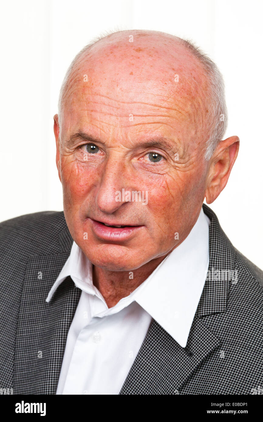 Senior citizens portrait. Portrait of a friendly older man Stock Photo