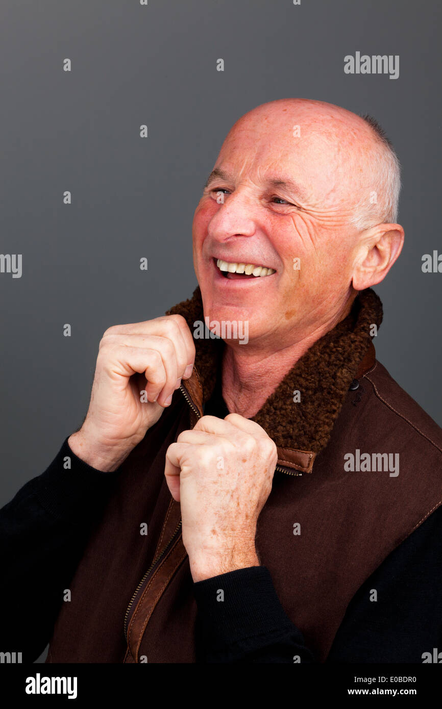 Senior citizens portrait. Portrait of a friendly older man Stock Photo
