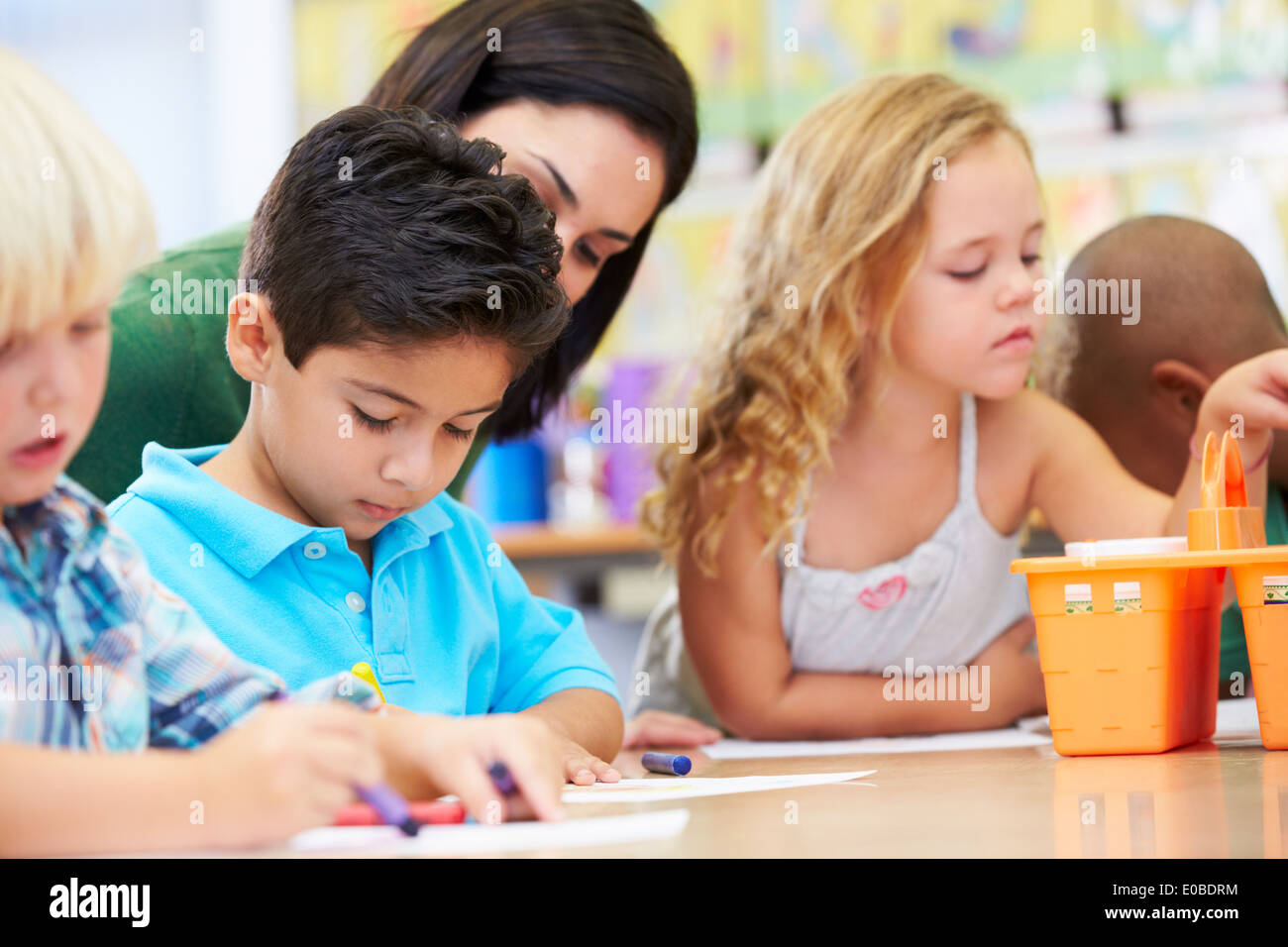 Group Of Elementary Age Children In Art Class With Teacher Stock Photo ...