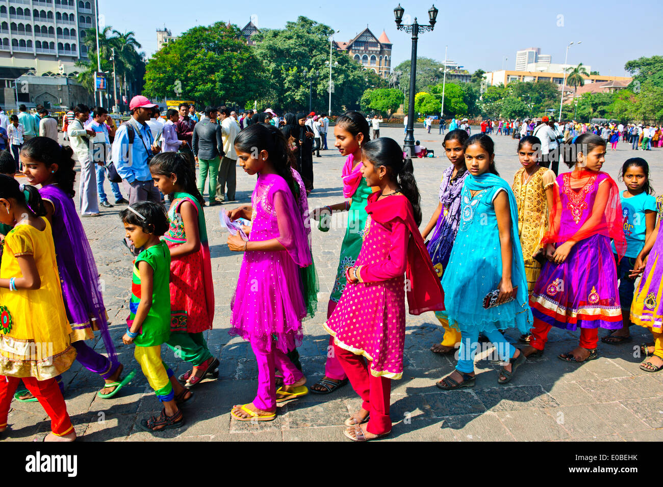 Gate of India,Appollo Bunder,Square,Tourists,School Children in Colorful Saris,promenade,Ferry terminal,Bombay,Mumbai,India Stock Photo