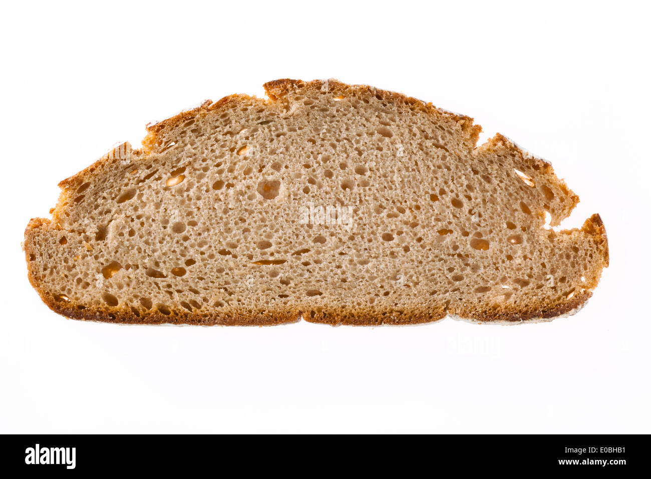 Close-up of a disc of bread. Background for healthy food., Nahaufnahme einer Scheibe Brot. Hintergrund fuer gesunde Ernaehrung. Stock Photo