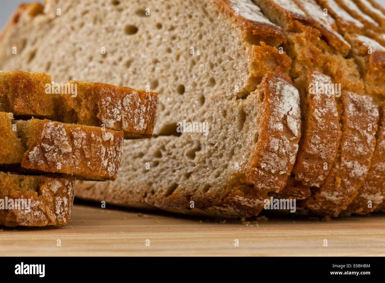 Several slices of dark bread lie side by side Stock Photo
