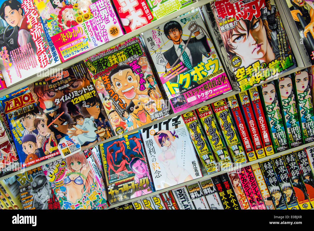 Manga comics magazines and publications at newsagent's, Tokyo, Japan Stock Photo