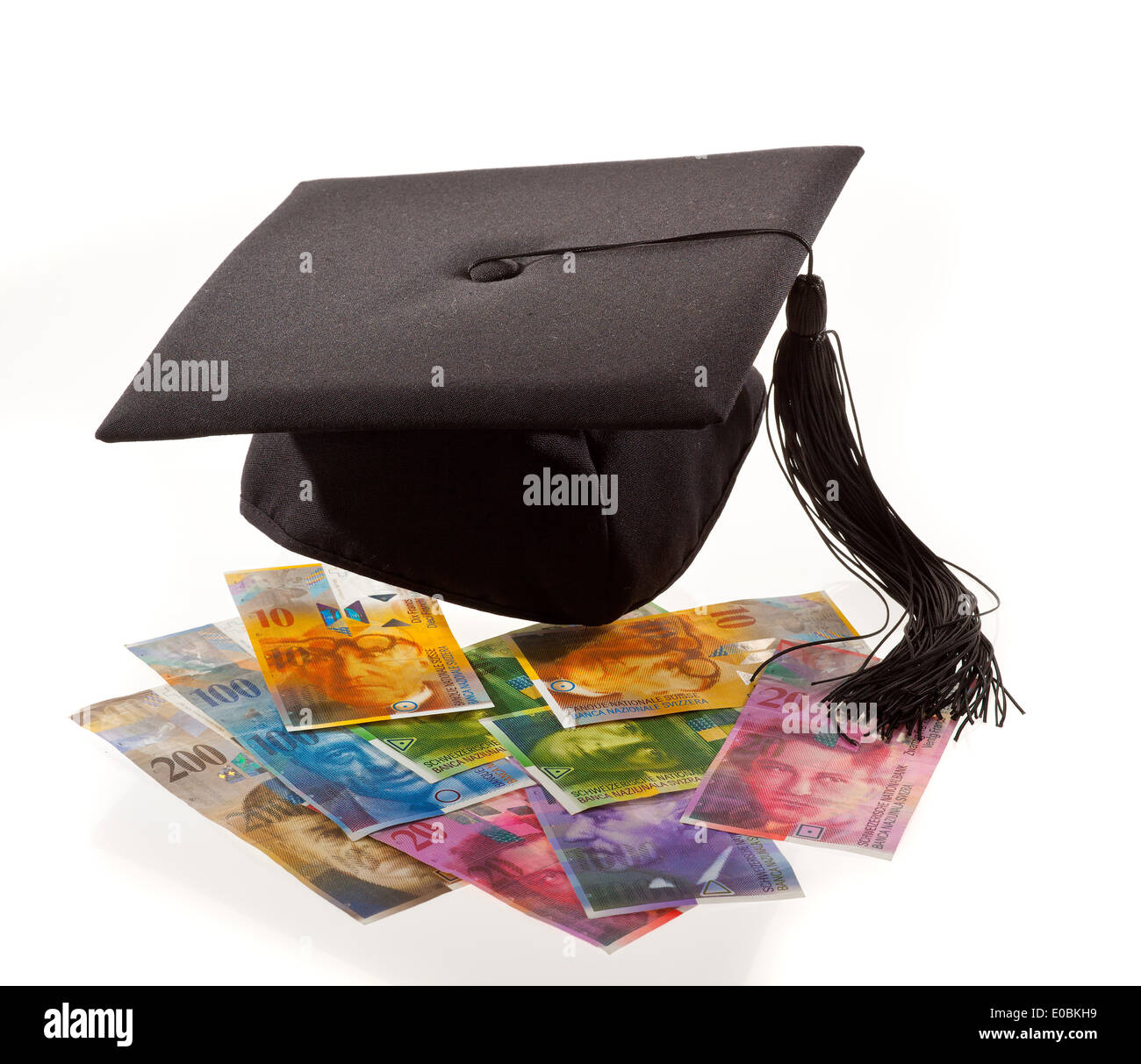 Doctoral cap and Swiss franc. Educational costs in Switzerland, Doktorhut und Schweizer Franken. Bildungskosten in der Schweiz Stock Photo