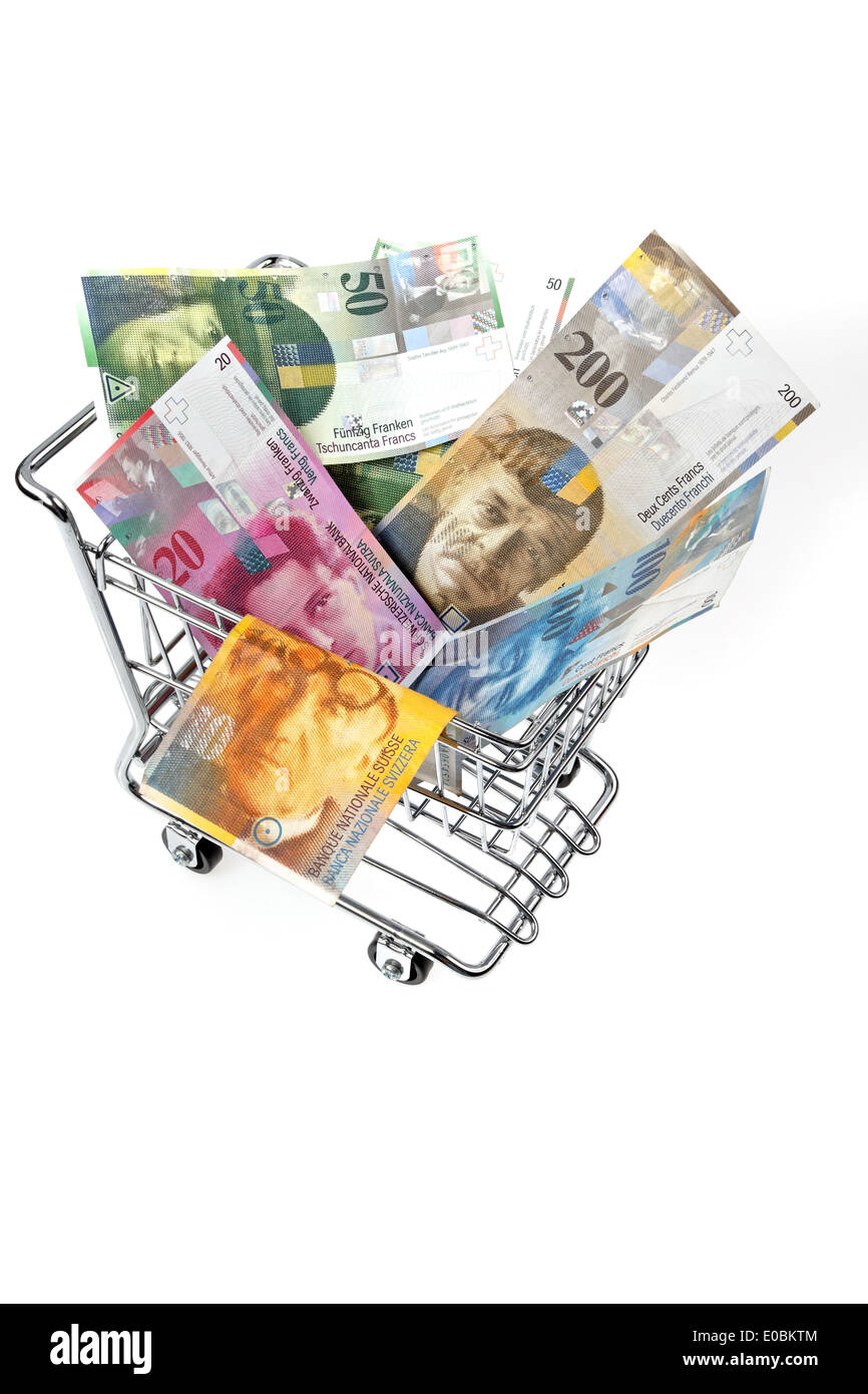 Money Swiss franc of bank notes in a shopping basket, Geld Schweizer Franken Geldscheine in einem Einkaufskorb Stock Photo