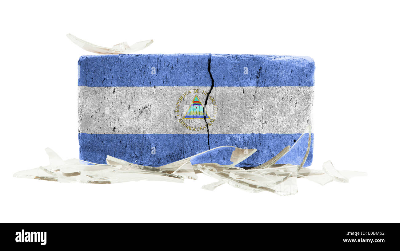 Brick with broken glass violence concept flag of Nicaragua Stock Photo ...