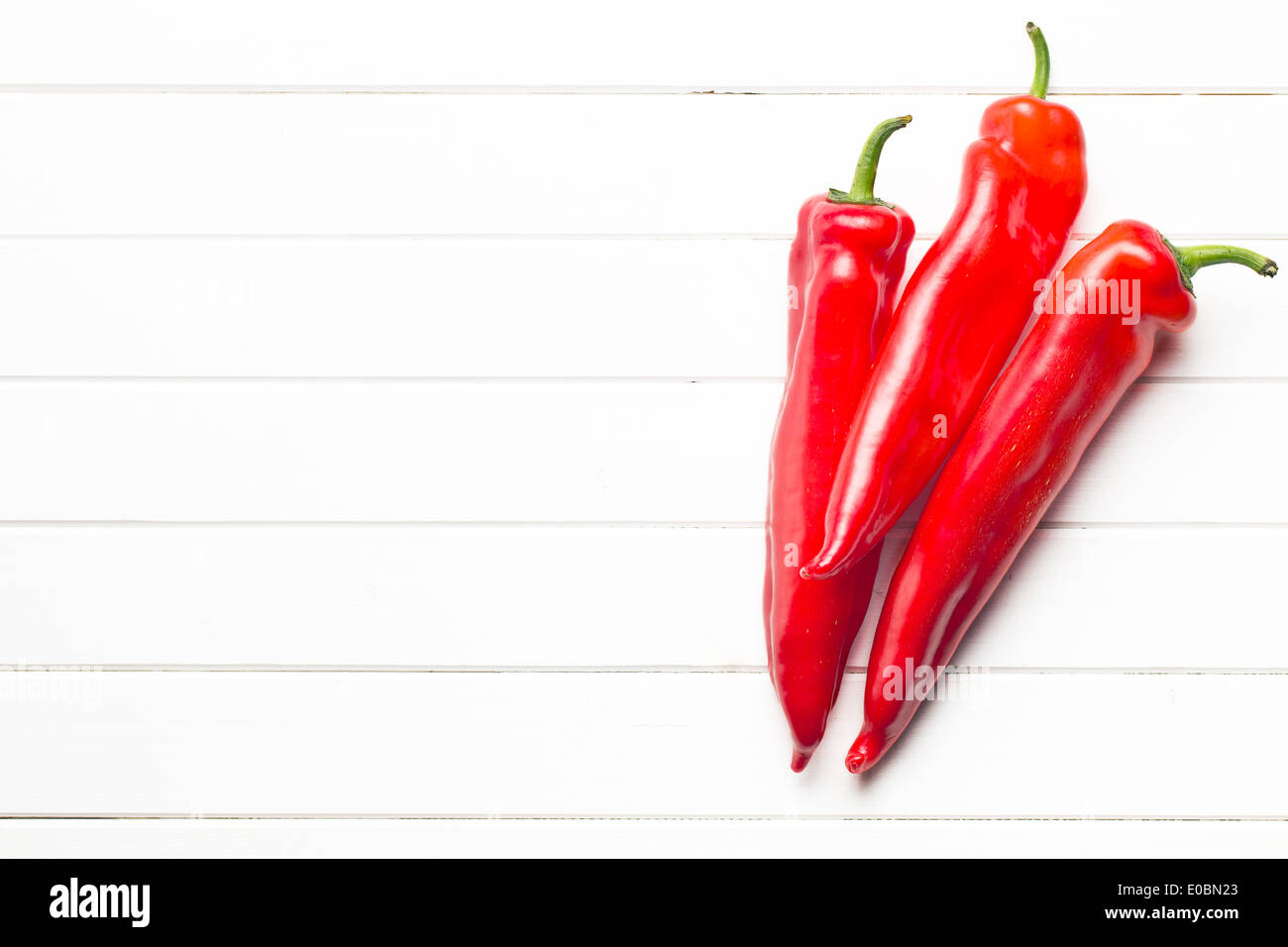 the red pepper on kitchen table Stock Photo - Alamy