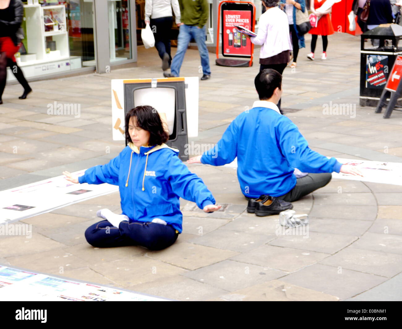 Newcastle upon Tyne, UK. 8th. May, 2014.  Supporters stage peaceful meditation protest against persecution of Falun Gong by the Chinese government. Credit:  Victor W. Adams/Alamy Live News Stock Photo