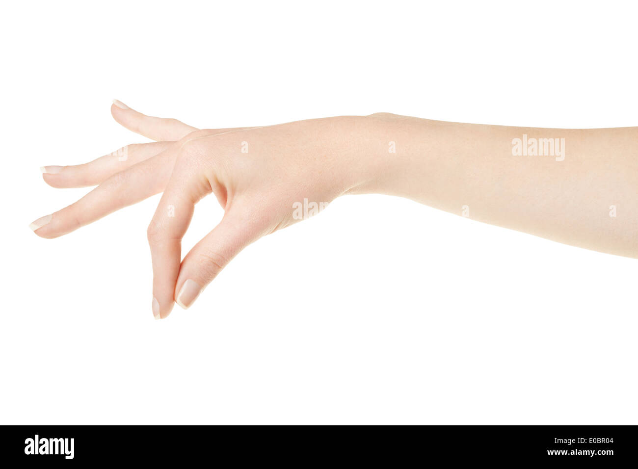 Woman hand with manicure holding items Stock Photo