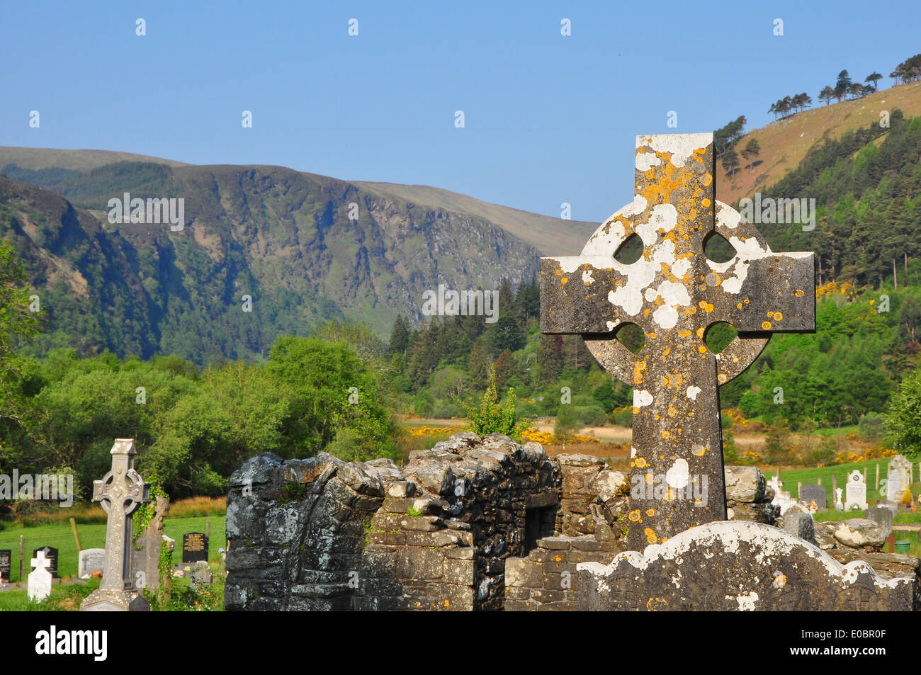 Celtic Cross against Irish Landscape Stock Photo
