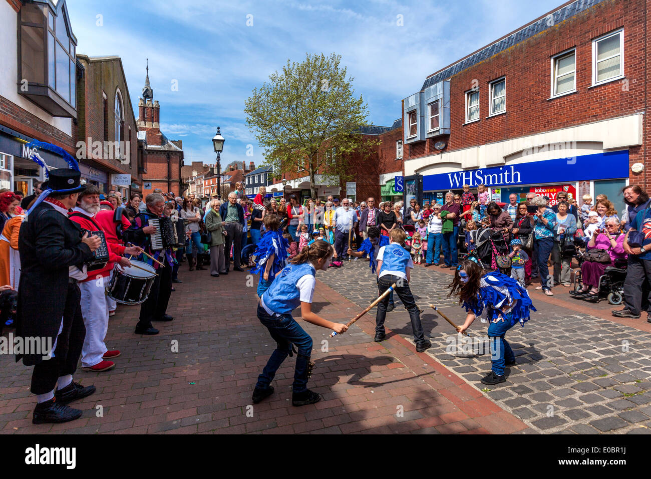 The Plumpton Black Brook Childrens Morris Dancers Perform In The Precinct, Lewes, Sussex, England (May Day 2014) Stock Photo