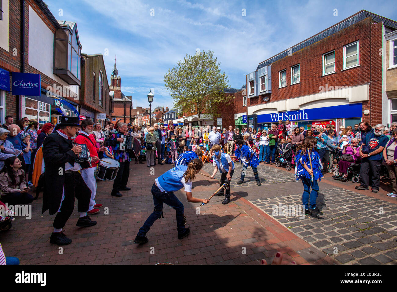 The Plumpton Black Brook Childrens Morris Dancers Perform In The Precinct, Lewes, Sussex, England (May Day 2014) Stock Photo