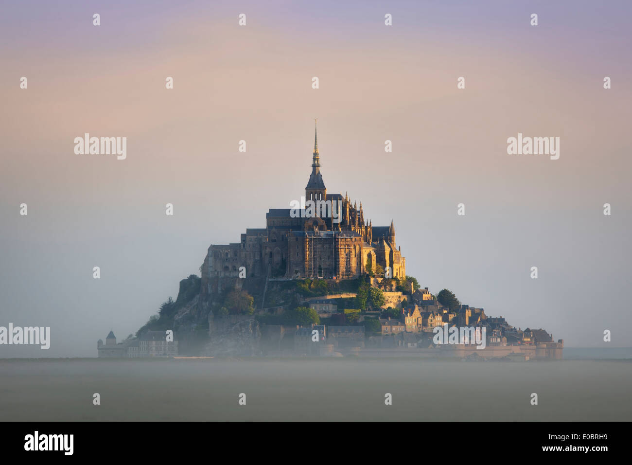 Misty dawn at Le Mont Saint Michel, Normandy France Stock Photo