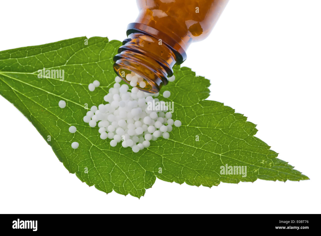 Globuli to the treatment of illnesses in the gentle, alternative medicine. Tablets and drugs Stock Photo