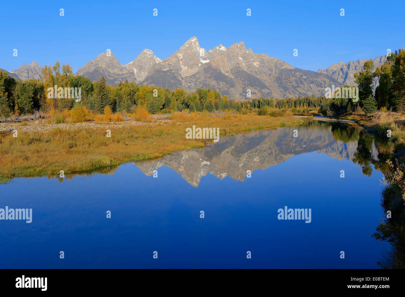 Teton Mountain Range mirrored in Snake River, Grand Teton National Park, Wyoming, USA Stock Photo