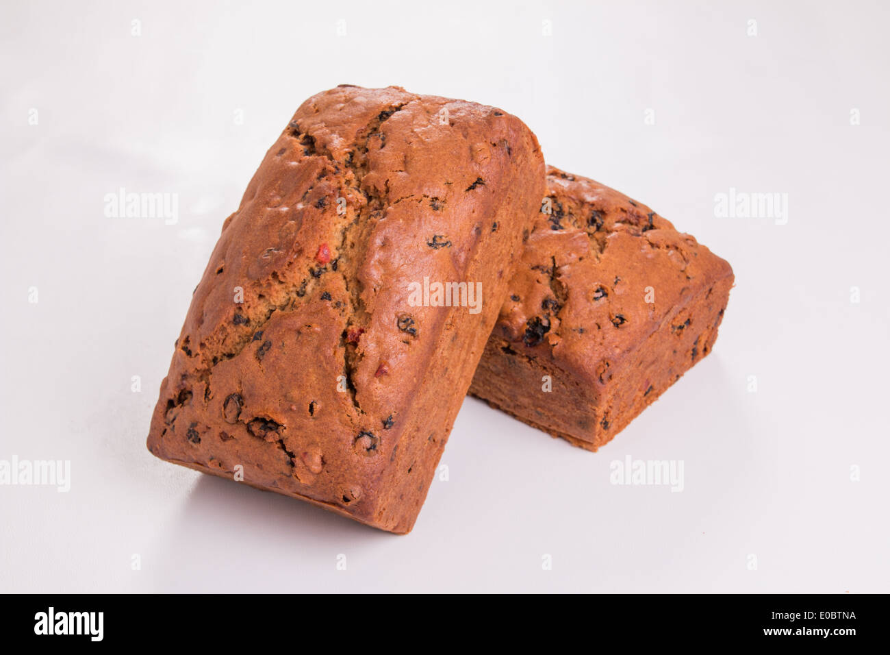 2 Fruit loaves cakes isolated on white   'cut out' co ( 7 of 19) Stock Photo