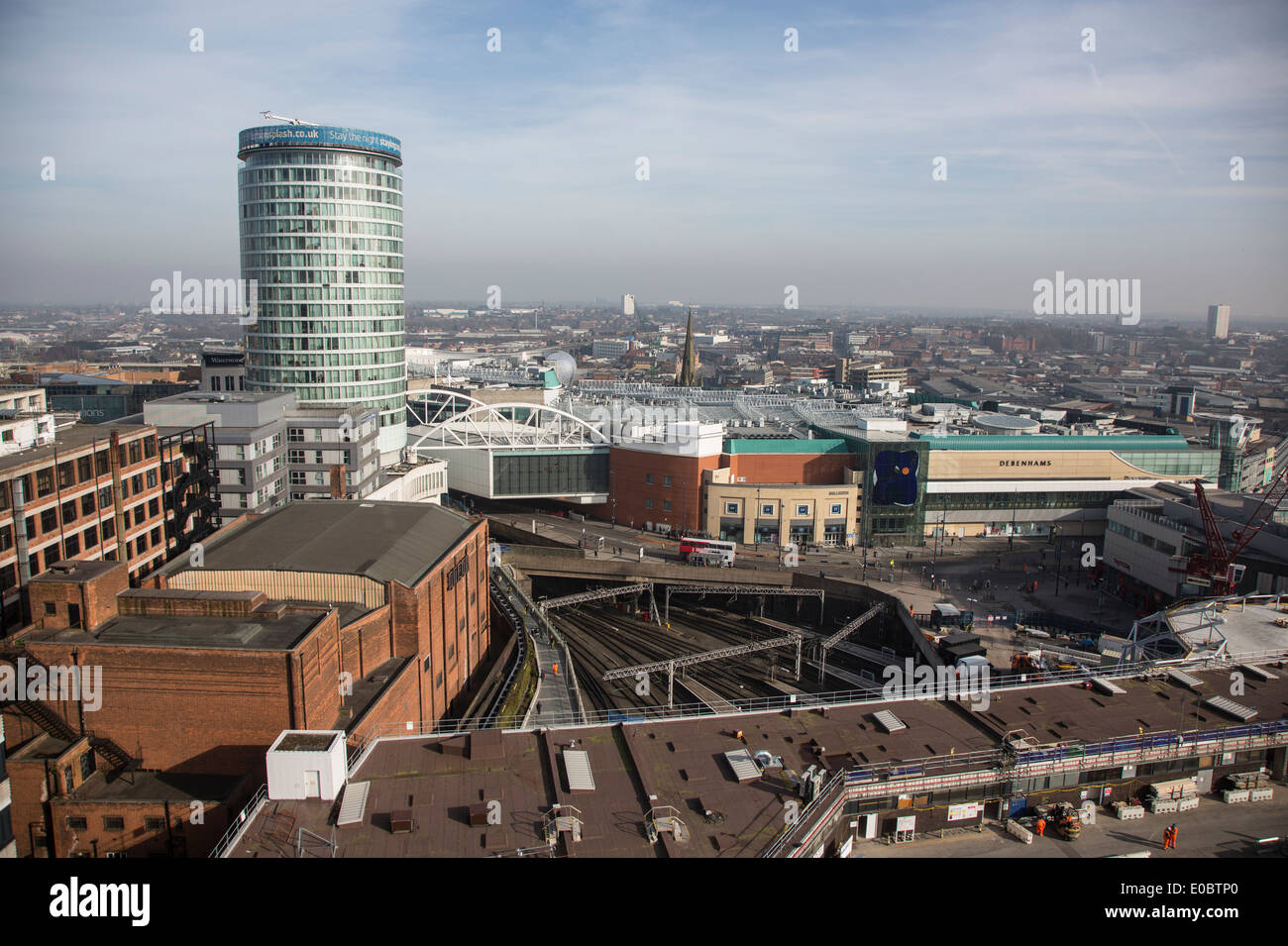 A view of Birmingham City Centre showing the Rotunda , New Street Railway station at the Bull Ring Shopping complex. Stock Photo