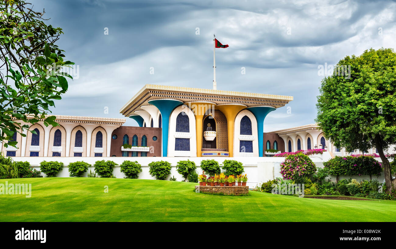 Picture of Sultan Qaboos Palace with green meadow in Muscat, Oman Stock Photo