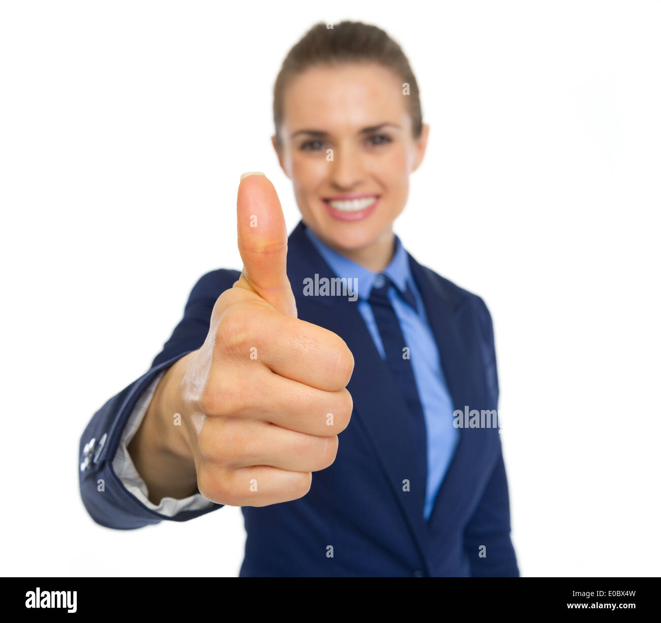 Closeup on happy business woman showing thumbs up Stock Photo - Alamy