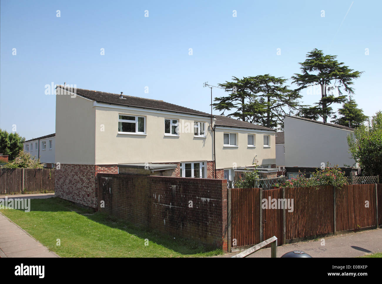 a 1970's built housing estate after overcladding with external insulation panels, re-faced with concrete render and brick slips. Stock Photo