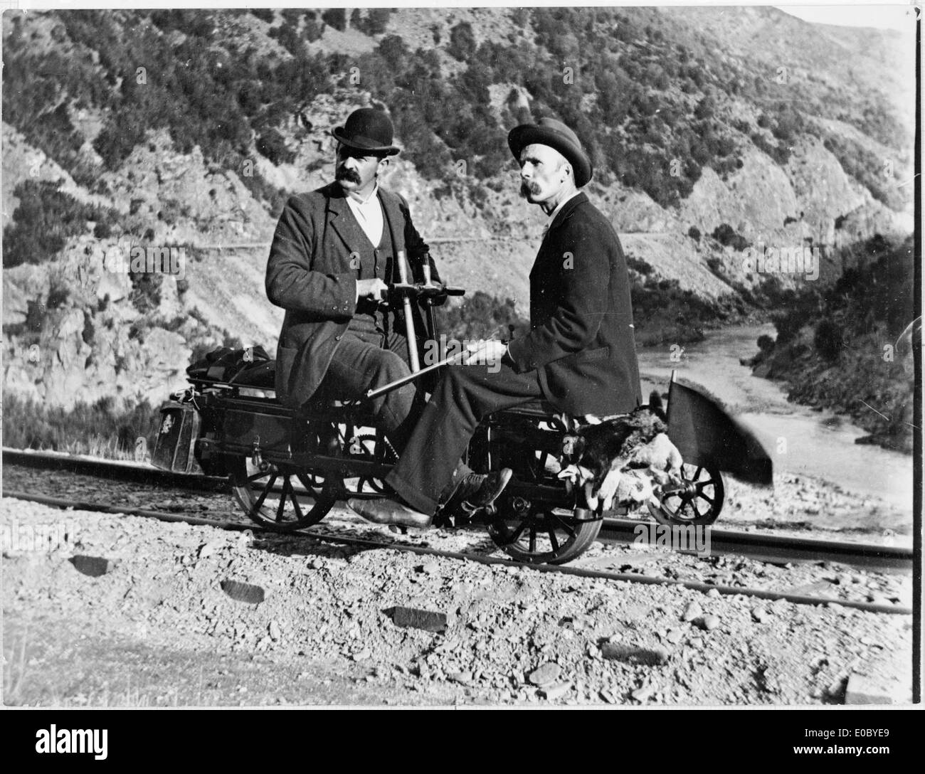 William Williams on a railway jigger, rabbit hunting in Otago, ca 1900 Stock Photo