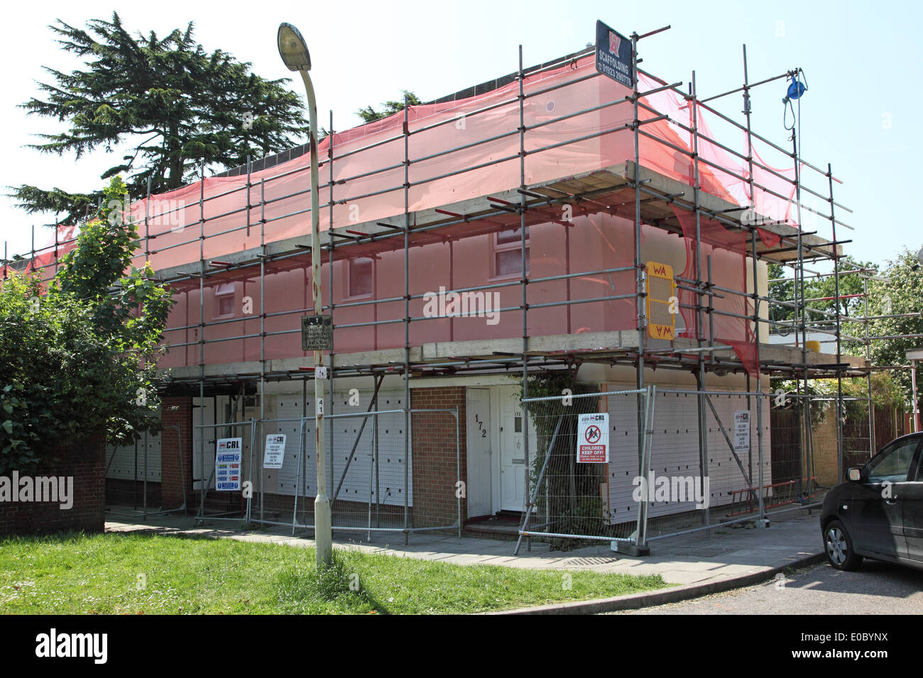 A 1970's built housing estate after overcladding with external insulation panels, re-faced with concrete render and brick slips. Stock Photo