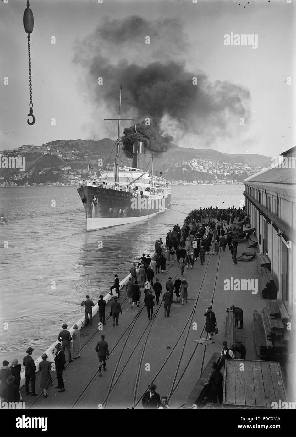 A photograph of the ship Tahiti docked at Wellington Harbour in 1928 or 1929, showcasing the ocean liner's design and the bustling port. Stock Photo