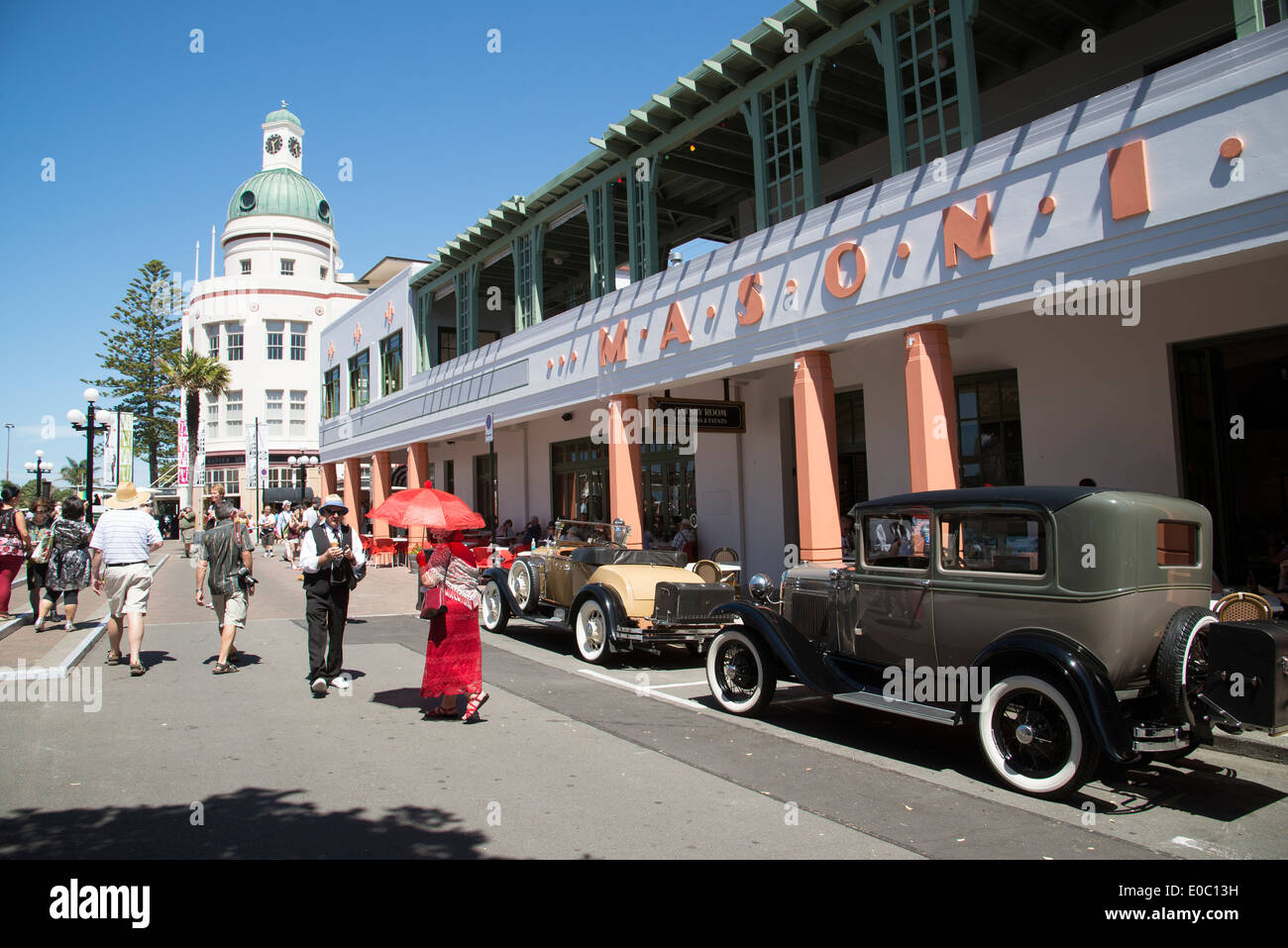 Classic vintage cars outside the Masonic Hotel in the art deco town of Napier New Zealand An annual event attracting visitors Stock Photo