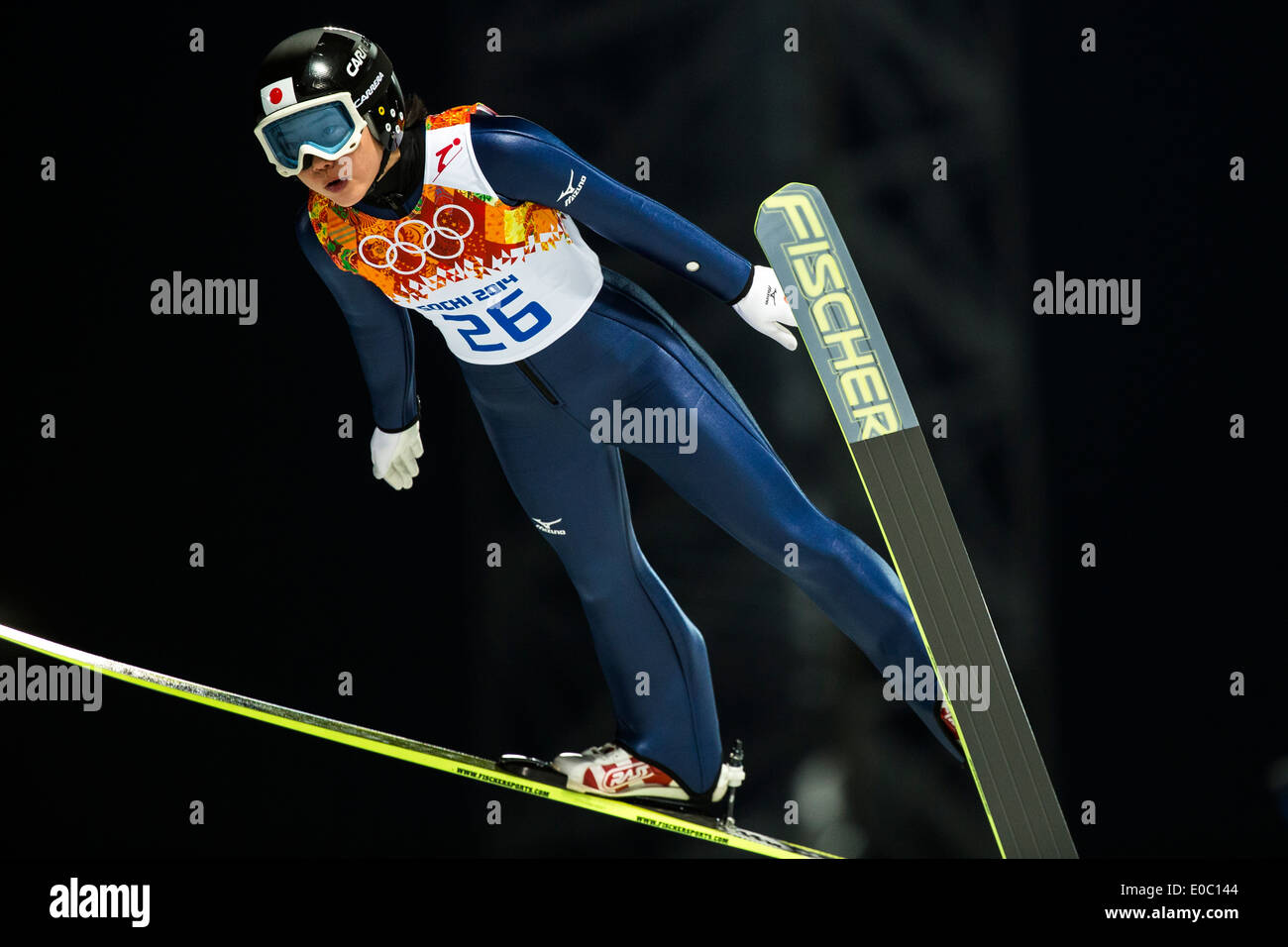 Japanese ski jumper Yuki Ito (C) poses after winning a World Cup 