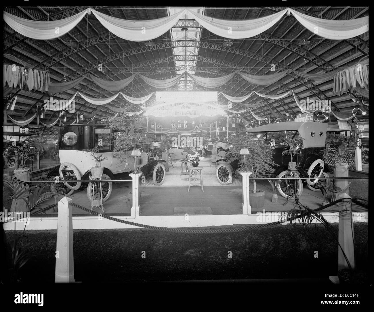 A vintage photograph showing a motor show held at King Edward Barracks in Christchurch, New Zealand, between 1921 and 1925, showcasing various vintage automobiles. Stock Photo