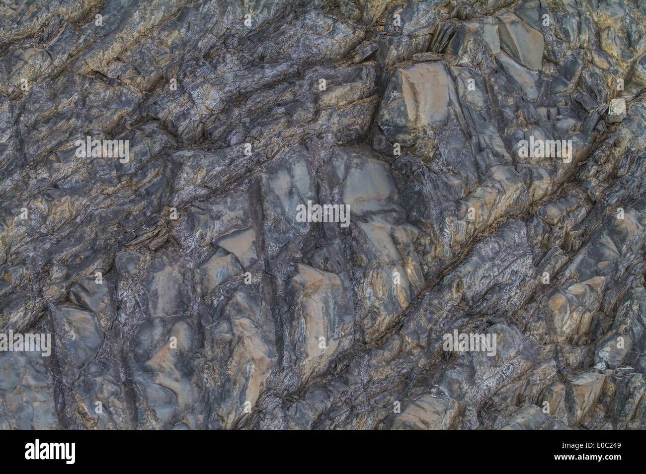 Rugged, textured, mountain rock face, full frame shot. Stock Photo
