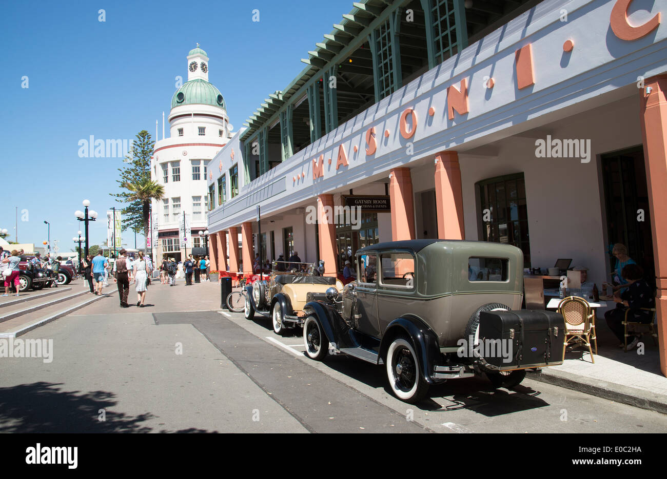 Classic vintage cars outside the Masonic Hotel in the art deco town of Napier New Zealand An annual event attracting visitors Stock Photo