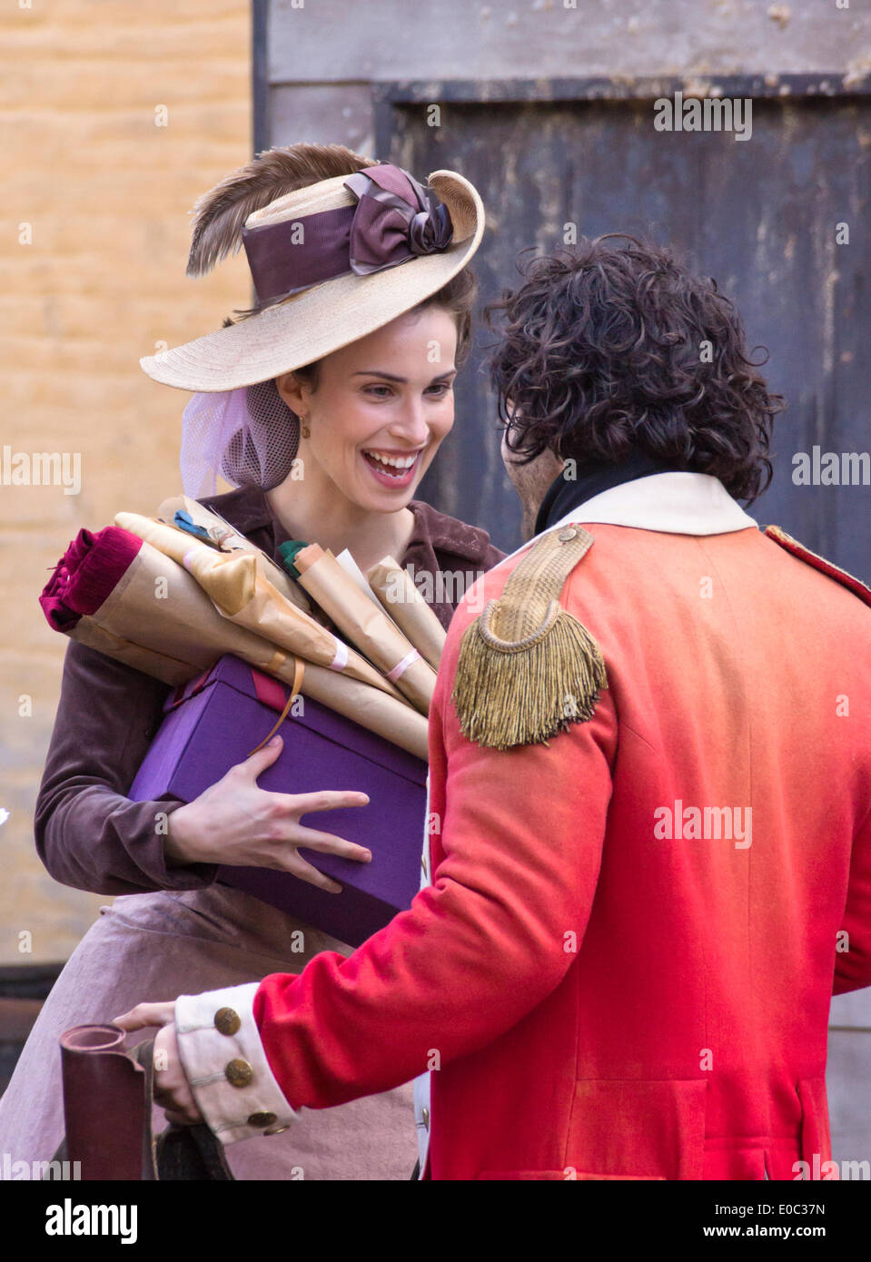 Corsham Wiltshire 6th May 2014  Filming the BBC drama Poldark on location in Corsham Wiltshire. The BBC have taken over this small country town to remake their hit 1970's drama based upon the works of Winston Graham. Aidan Turner and Heida Reed Credit:  Mr Standfast/Alamy Live News Stock Photo